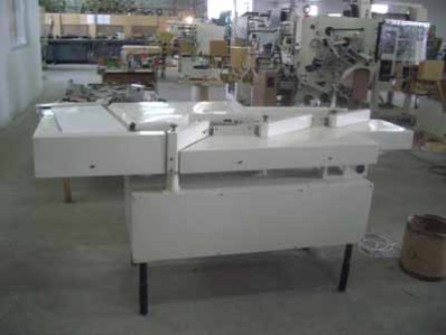 MG-1 NAGEMA FEEDER TO WRAPPING MACHINE